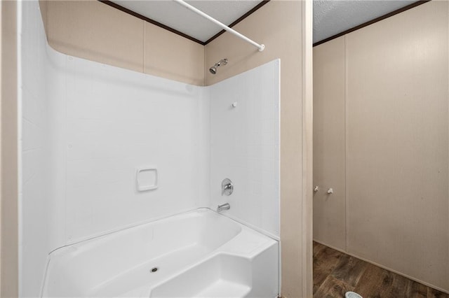 6550 Oak Grove Rd, Eight Mile, AL 36613 - full bathroom featuring wood finished floors and bathtub / shower combination