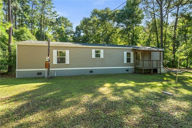 6550 Oak Grove Rd, Eight Mile, AL 36613 - rear view of property with crawl space, a yard, and a wooden deck