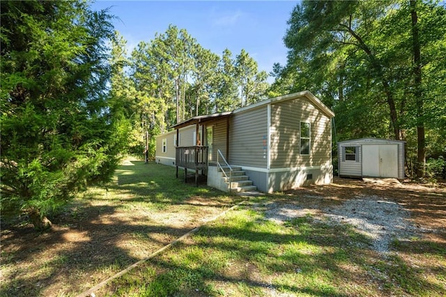 6550 Oak Grove Rd, Eight Mile, AL 36613 - view of property exterior with a lawn