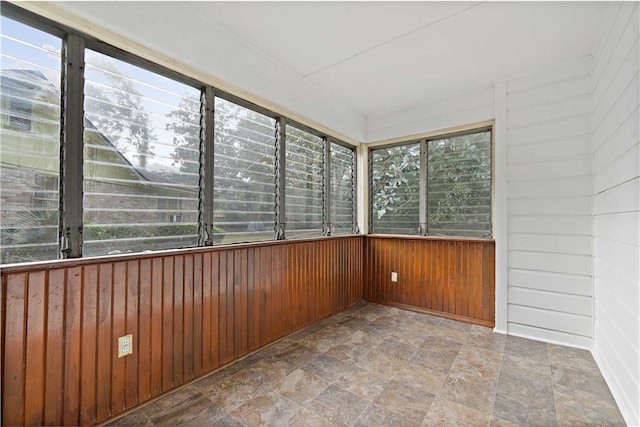 unfurnished sunroom with a healthy amount of sunlight