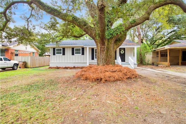 view of front of home with a front yard