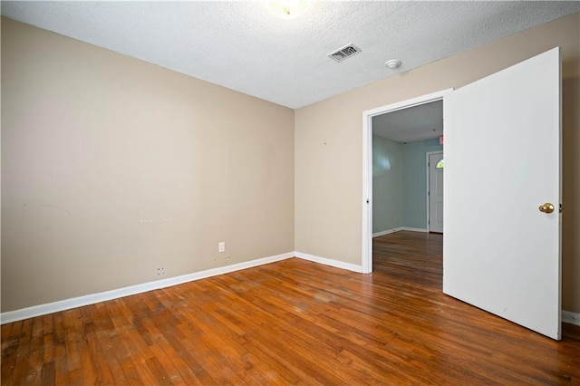 17714 Horseneck Rd, Bay Minette, AL 36507 - unfurnished room with visible vents, baseboards, and wood-type flooring