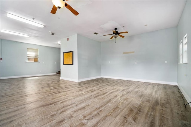 17714 Horseneck Rd, Bay Minette, AL 36507 - empty room with a ceiling fan, baseboards, and wood finished floors