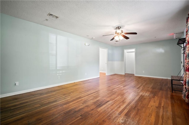 17714 Horseneck Rd, Bay Minette, AL 36507 - interior space featuring a textured ceiling, baseboards, ceiling fan, visible vents, and wood finished floors