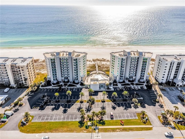 aerial view with a beach view and a water view