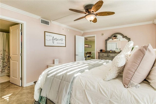 bedroom with ceiling fan, crown molding, and light tile patterned flooring