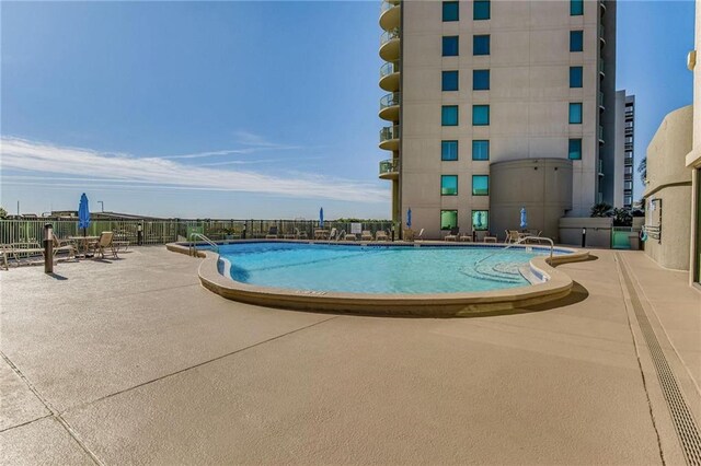 view of pool with a patio