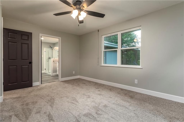 11375 Wacker Dr, Theodore, AL 36582 - unfurnished bedroom featuring carpet, ensuite bath, and ceiling fan