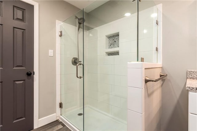 11375 Wacker Dr, Theodore, AL 36582 - full bath with a stall shower and wood finished floors