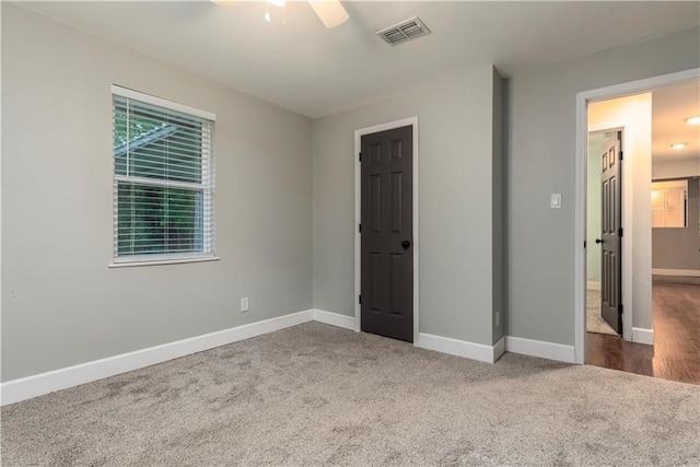 11375 Wacker Dr, Theodore, AL 36582 - unfurnished bedroom with carpet flooring and ceiling fan