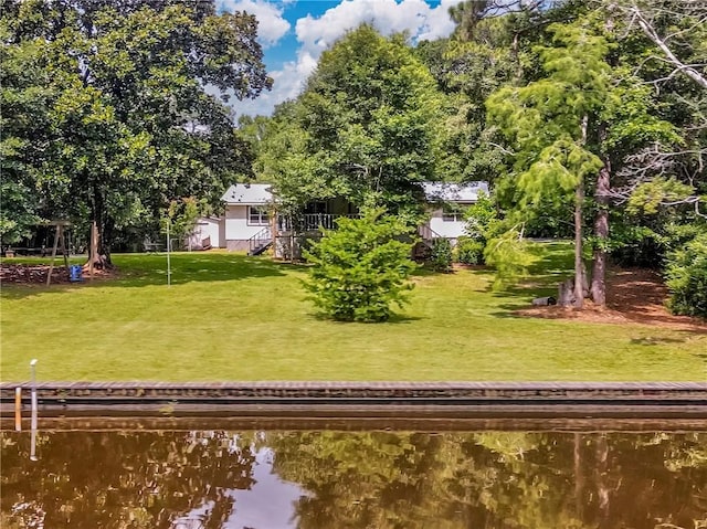 11375 Wacker Dr, Theodore, AL 36582 - rear view of property with a water view and a yard