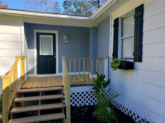 property entrance featuring a porch