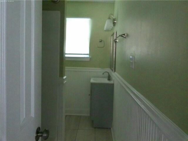 bathroom with vanity and tile patterned floors