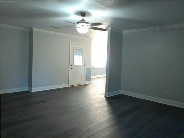 spare room with ornamental molding, ceiling fan, a textured ceiling, and dark hardwood / wood-style flooring