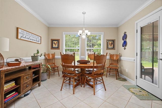 7115 Haleys Way, Theodore, AL 36582 - dining area featuring crown molding, a chandelier, light tile patterned flooring, and baseboards