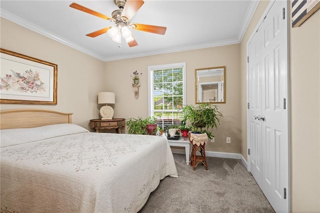 7115 Haleys Way, Theodore, AL 36582 - bedroom with carpet, ornamental molding, baseboards, a ceiling fan, and a closet
