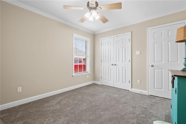 7115 Haleys Way, Theodore, AL 36582 - unfurnished bedroom with carpet flooring, ornamental molding, baseboards, a closet, and ceiling fan
