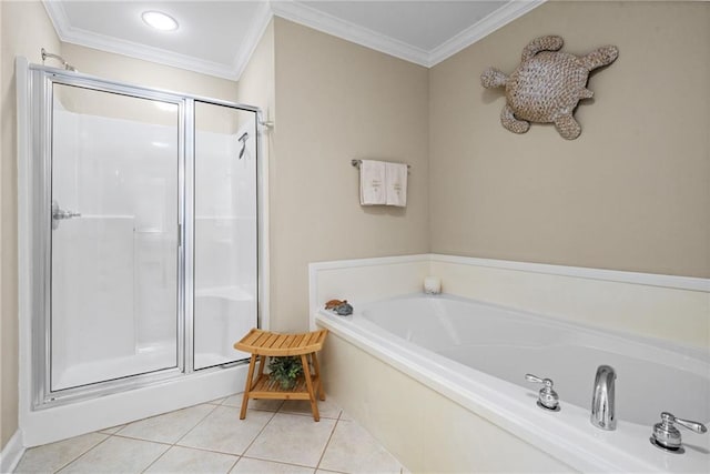 7115 Haleys Way, Theodore, AL 36582 - full bath with tile patterned floors, a shower stall, ornamental molding, a garden tub, and baseboards