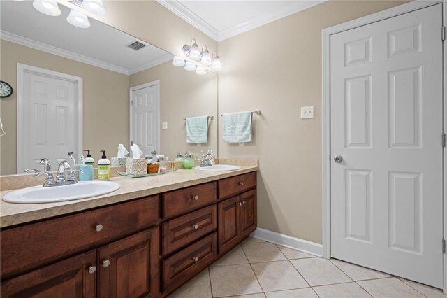 7115 Haleys Way, Theodore, AL 36582 - bathroom featuring tile patterned flooring, ornamental molding, double vanity, and baseboards