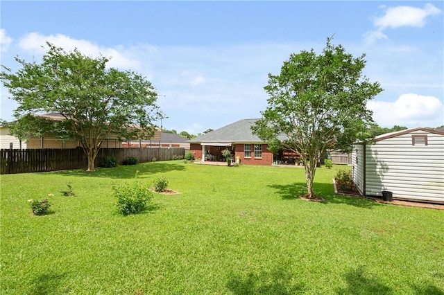 7115 Haleys Way, Theodore, AL 36582 - view of yard with an outdoor structure and a shed
