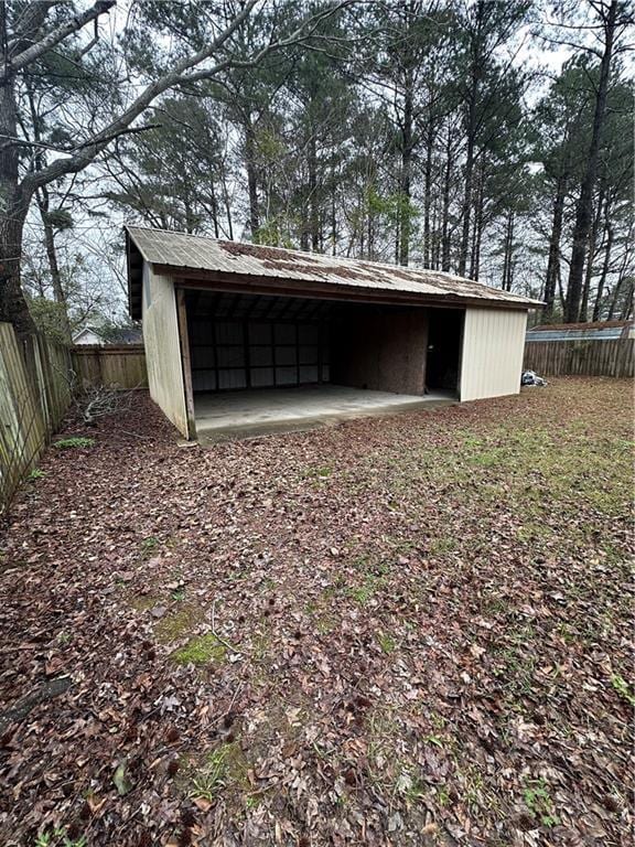 view of pole building with a fenced backyard