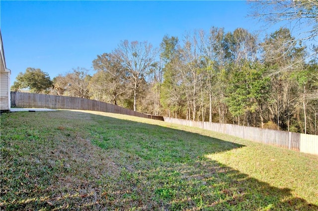 view of yard featuring a fenced backyard