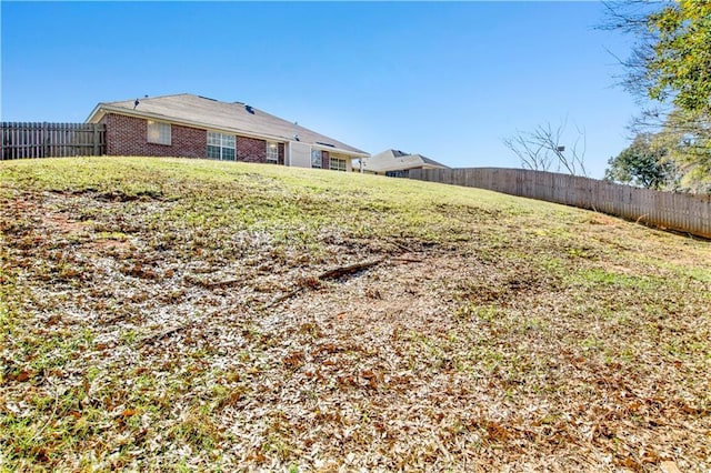 view of yard featuring a fenced backyard