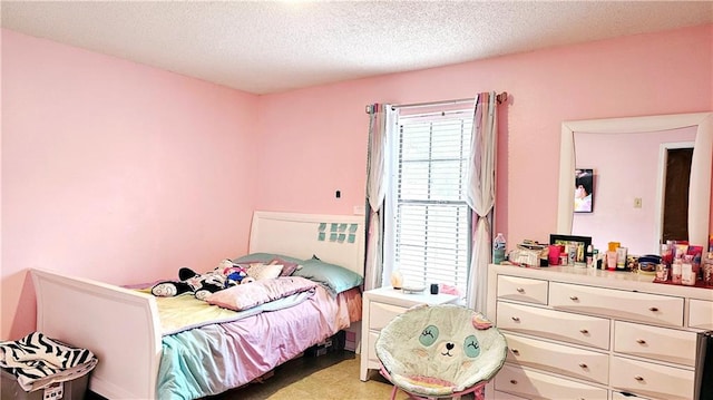 bedroom with a textured ceiling