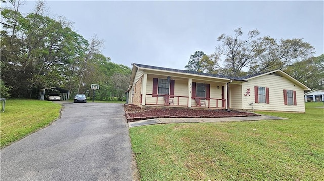 single story home with a porch and a front lawn