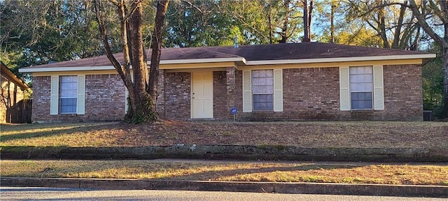 single story home featuring cooling unit