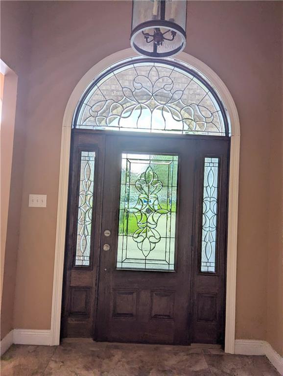 foyer with baseboards