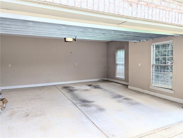 garage featuring baseboards