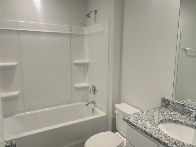 full bathroom featuring toilet, shower / washtub combination, and vanity