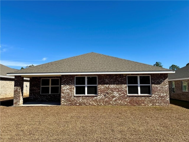 back of house with a patio area