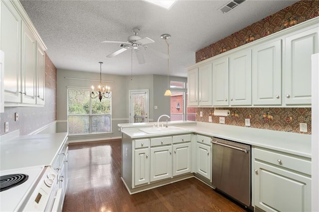 kitchen featuring sink, stainless steel dishwasher, kitchen peninsula, pendant lighting, and white cabinets