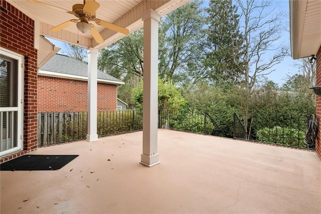 view of patio featuring ceiling fan