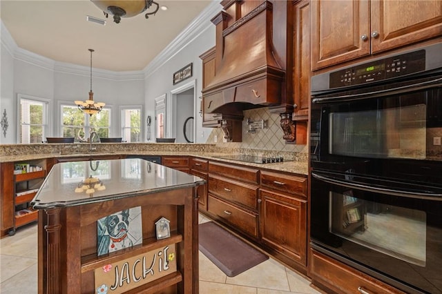 kitchen with light stone counters, black appliances, light tile patterned floors, custom range hood, and visible vents