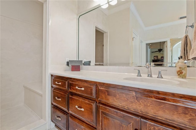 bathroom with visible vents, vanity, and ornamental molding