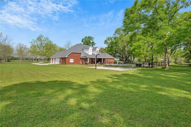 view of yard with an attached garage