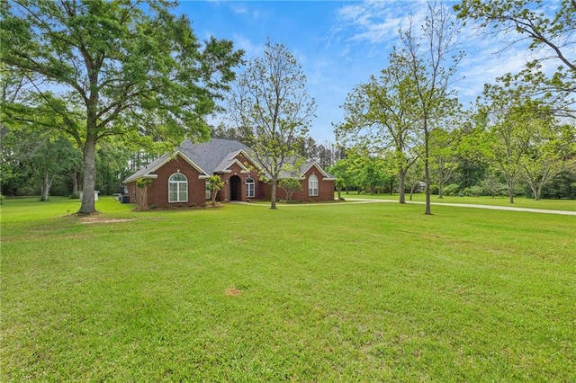 view of front of home with a front lawn