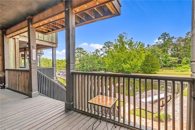 311 Magnolia Ave Unit 54, Satsuma, AL 36572 - deck featuring view of scattered trees