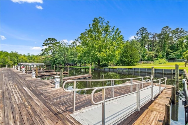 311 Magnolia Ave Unit 54, Satsuma, AL 36572 - dock area featuring view of scattered trees and a water view