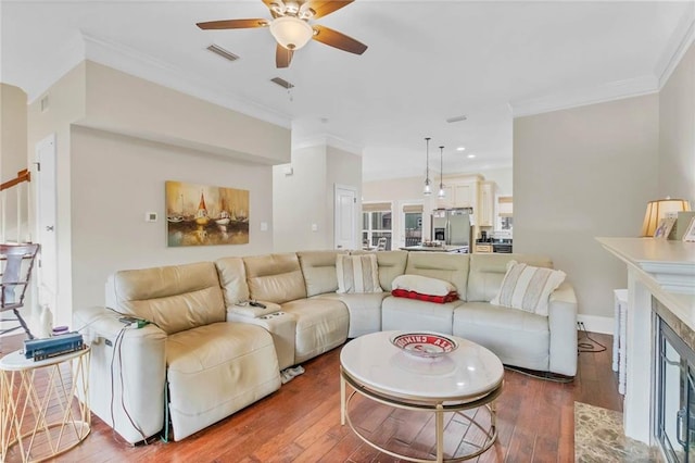 311 Magnolia Ave Unit 54, Satsuma, AL 36572 - living room with ceiling fan, wood-type flooring, ornamental molding, recessed lighting, and baseboards