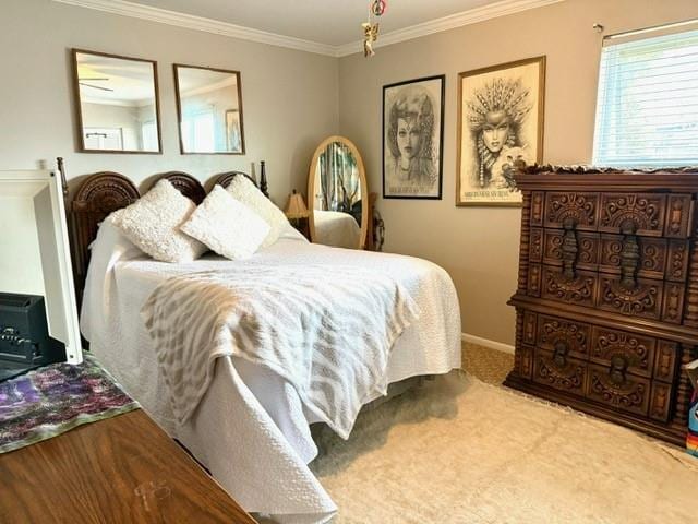 carpeted bedroom featuring ornamental molding