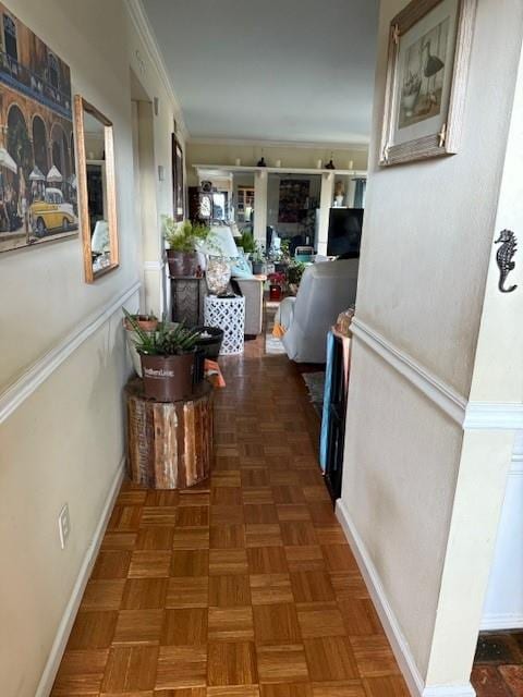 corridor featuring crown molding and dark parquet flooring