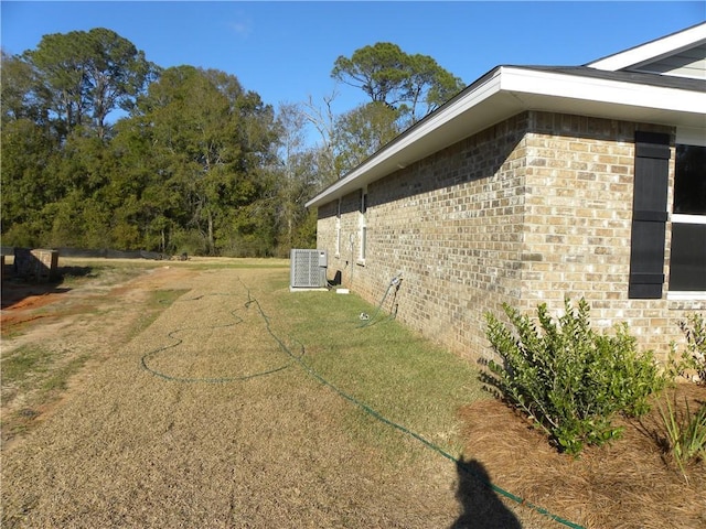 view of home's exterior featuring central AC unit