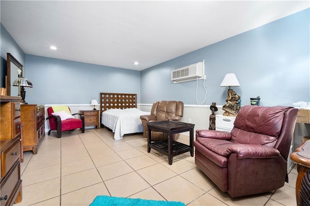 bedroom featuring a wall unit AC, light tile patterned flooring, and recessed lighting
