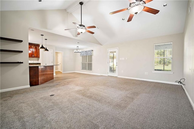 unfurnished living room featuring high vaulted ceiling, beamed ceiling, light colored carpet, and ceiling fan with notable chandelier