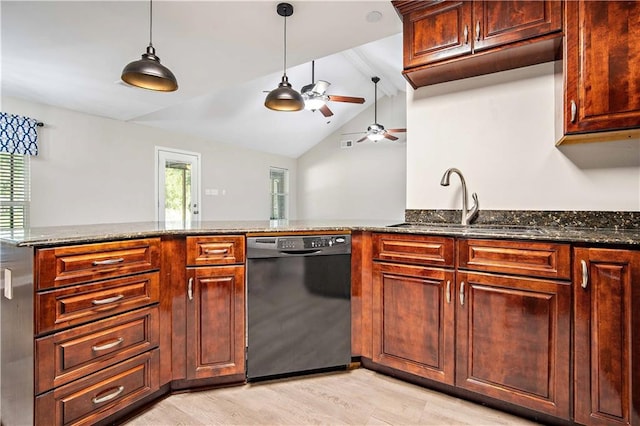 kitchen with black dishwasher, hanging light fixtures, sink, vaulted ceiling, and light hardwood / wood-style floors