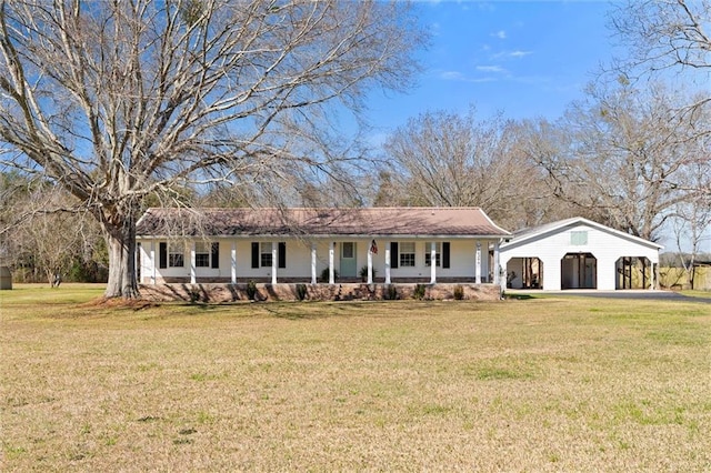 ranch-style home with a porch, a garage, and a front lawn